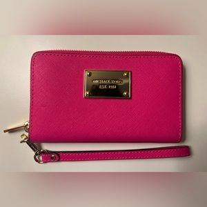 Small Saffiano leather smartphone wristlet.